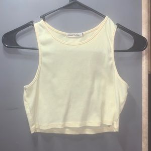 Yellow crop top it says Size Medium but it’s really like a Small